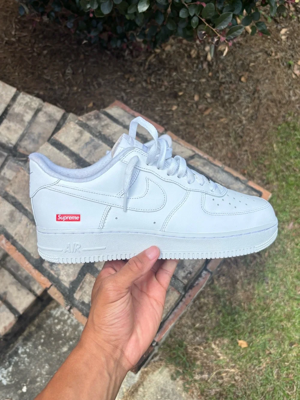 Nike White Low-Top Leather Sneaker with Red Supreme Box Logo